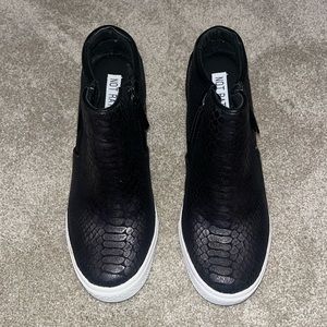 Black snakeskin wedge sneakers